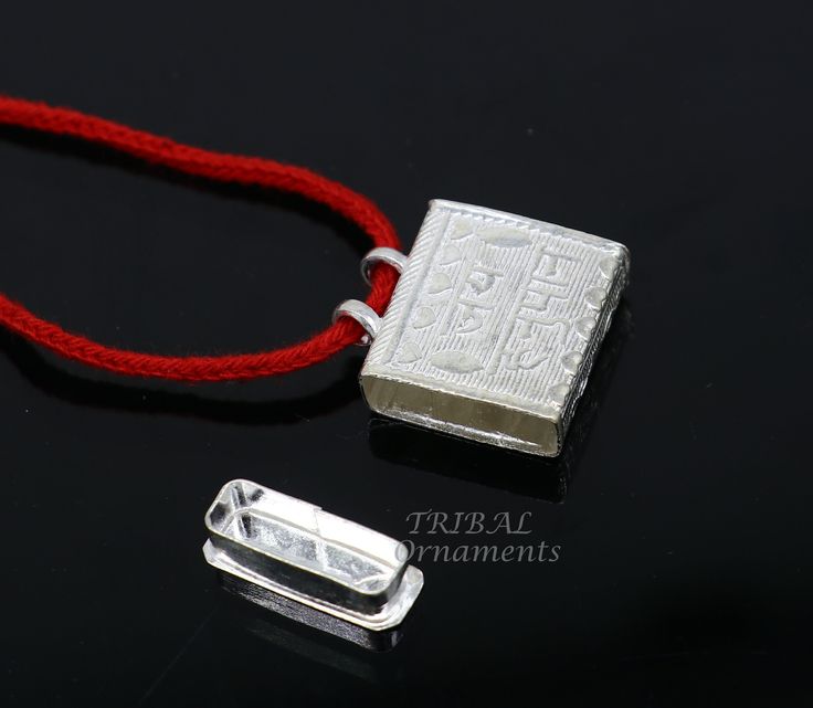 This is a mantra box pendant, widely used in India from protecting negative energy or evil eyes.  925 sterling silver handmade gorgeous customized amulet taviz pendant, excellent box container pendant necklace amazing belly dance bridesmaid customized gifting jewelry from India. Metal-925 sterling silver. Item type-box pendant. Weight-4.160 grams. Length-2.3 centimetres. Width-2.0 centimetres. Stamped-925. Finish-Oxidized. Makes excellent gifting on birthdays, weddings, anniversary, mother's day Silver Rectangular Jewelry For Blessing, Silver Locket Jewelry For Blessing, Handmade Amulet Necklace With Rectangular Pendant, Sterling Silver Amulet Necklaces For Puja, Handmade Square Pendant Amulet Necklace, Silver Amulet With Polished Finish, Sterling Silver Amulet Necklace With Square Pendant, Mantra, Belly Dance