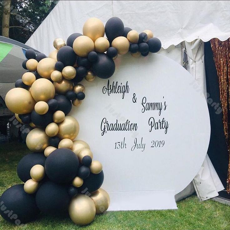 black and gold balloon arch for graduation party