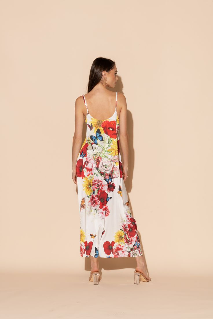 This is one Bouquet you won't want to throw away! Vibrant blooms of flora and fauna adorn this long chemise in our signature Polysilk fabric. Dance the night away, layer it up for brunch, or lounge in luxe - the occasions are endless in this beautiful, blossoming statement piece. Machine washable for ease of care. Silk Floral Print Dress For Brunch, Silk Floral Print Maxi Dress For Brunch, Chic Slip Dress For Sleep In Spring, Elegant Floral Print Slip Dress For Daywear, Chic Spring Slip Dress For Sleep, White Floral Print Slip Dress For Brunch, Summer Floral Print Maxi Dress For Daywear, Floral Print Maxi Dress With Spaghetti Straps For Daywear, Multicolor Floral Print Dresses For Loungewear