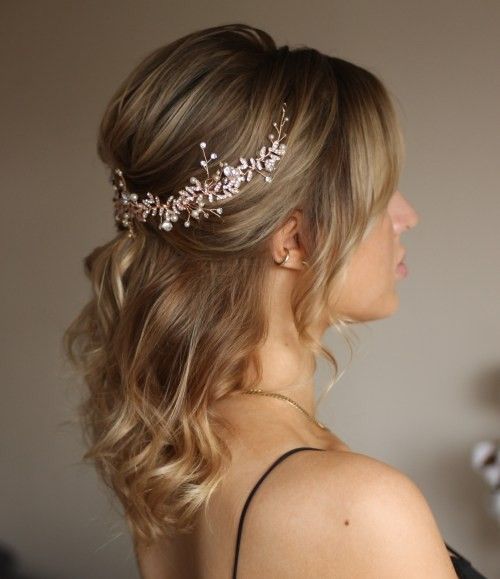 a woman wearing a bridal hair comb