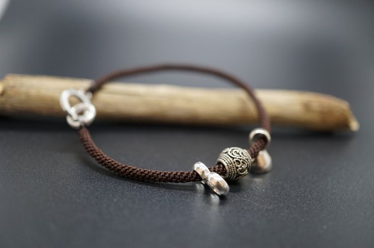 Thickness: 3mm, woven with six ropes, also known as corn knot Length: 7'', I can customize the length you want Finished with 925 silver twister Charms: 925 silver Rope color: brown We look forward to the opportunity of serving you！ Traditional Sterling Silver Adjustable Braided Bracelets, Traditional Adjustable Sterling Silver Braided Bracelet, Traditional Sterling Silver Braided Bracelet, Adjustable, Adjustable Braided Sterling Silver Bracelet As Gift, Adjustable Braided Sterling Silver Bracelet, Handmade Sterling Silver Braided Bohemian Bracelets, Handmade Sterling Silver Bohemian Braided Bracelets, Garnet Bead Bracelet, Braids With Weave