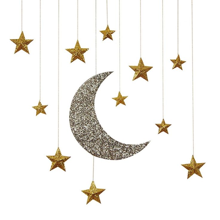 gold stars and a crescent hanging from strings on a white background with the moon in the middle