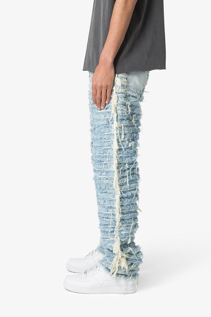 the V631 Allover Frayed Denims are designed with a baggy fit throughout, featuring a vintage wash, exposed and raw seams throughout, and finished off with raw hem. details relaxed fit* 100% cotton zipper at inseam model is 6’1, 140 lbs and wears a size 30 Blue Ripped Cotton Cargo Jeans, Ripped Blue Straight Leg Cargo Jeans, Ripped Cotton Bottoms In Washed Blue, Urban Style Medium Wash Rigid Denim Flare Jeans, Urban Flare Jeans In Medium Wash Rigid Denim, Distressed Blue Straight Leg Cargo Jeans, Urban Style Distressed Denim Blue Flare Jeans, Urban Denim Blue Distressed Flare Jeans, Urban Distressed Denim Blue Flare Jeans