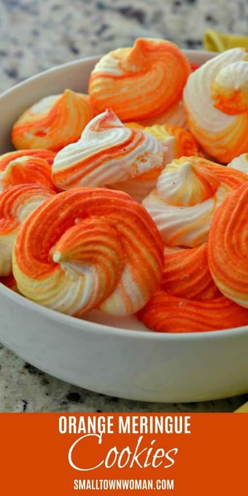 orange meringue cookies in a white bowl