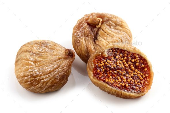 three walnuts with seeds on white background