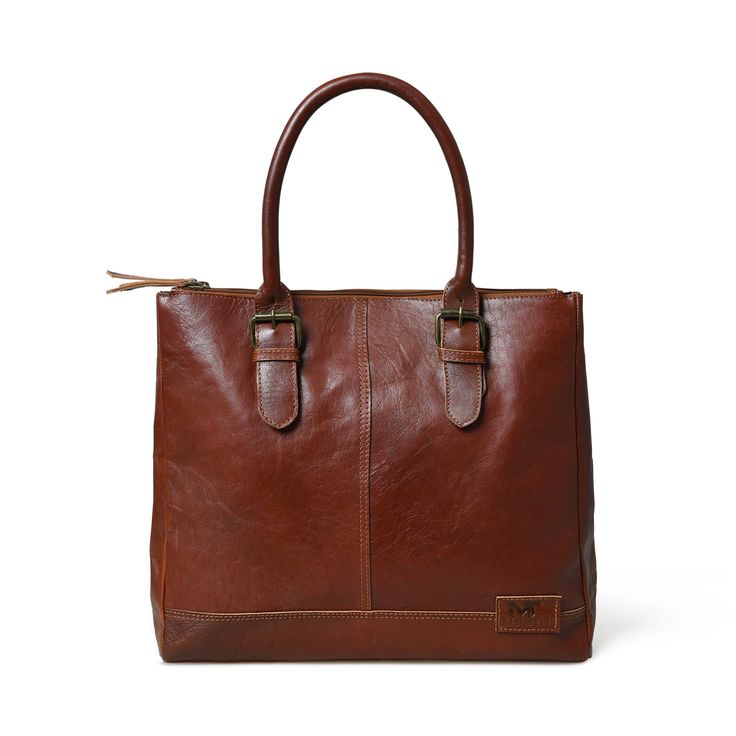 Introducing the City Chic Brown Leather Shoulder Tote—a versatile office bag designed for elegance and practicality. With a central compartment, inside pocket, and sturdy handles adorned with stylish buckles, it seamlessly blends class with functionality. Crafted from naturally tanned buffalo leather, this bag effortlessly transitions from office sophistication to casual chic. Perfect for brunch or quick outings with friends, it complements your style while prioritizing environmental responsibil Office Bag, Functional Fashion, Buffalo Leather, Chic Handbags, City Chic, Shoulder Tote, Red Leather, Inside Pocket, Fashion Statement