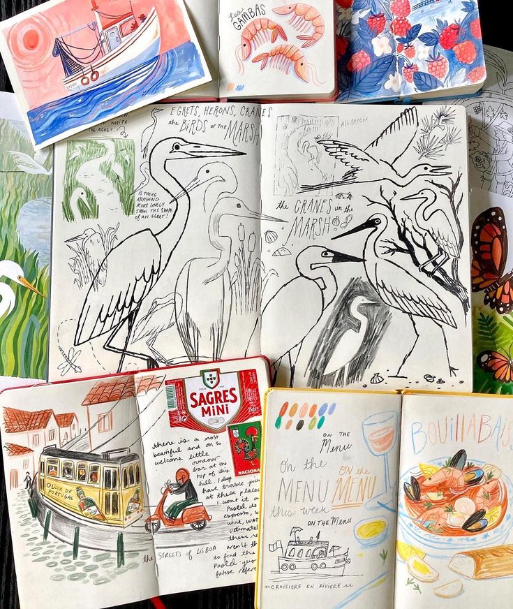 several children's books with drawings on them