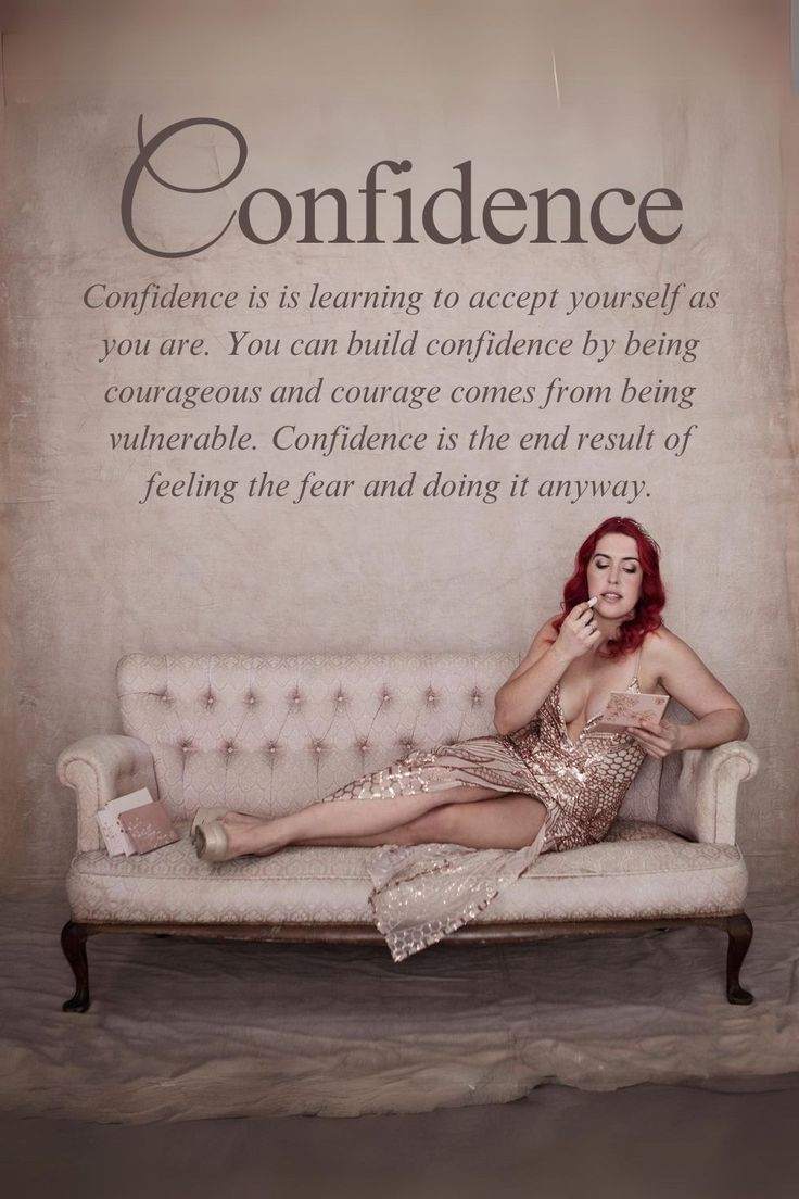 a woman sitting on top of a couch in front of a sign that says, confidentence