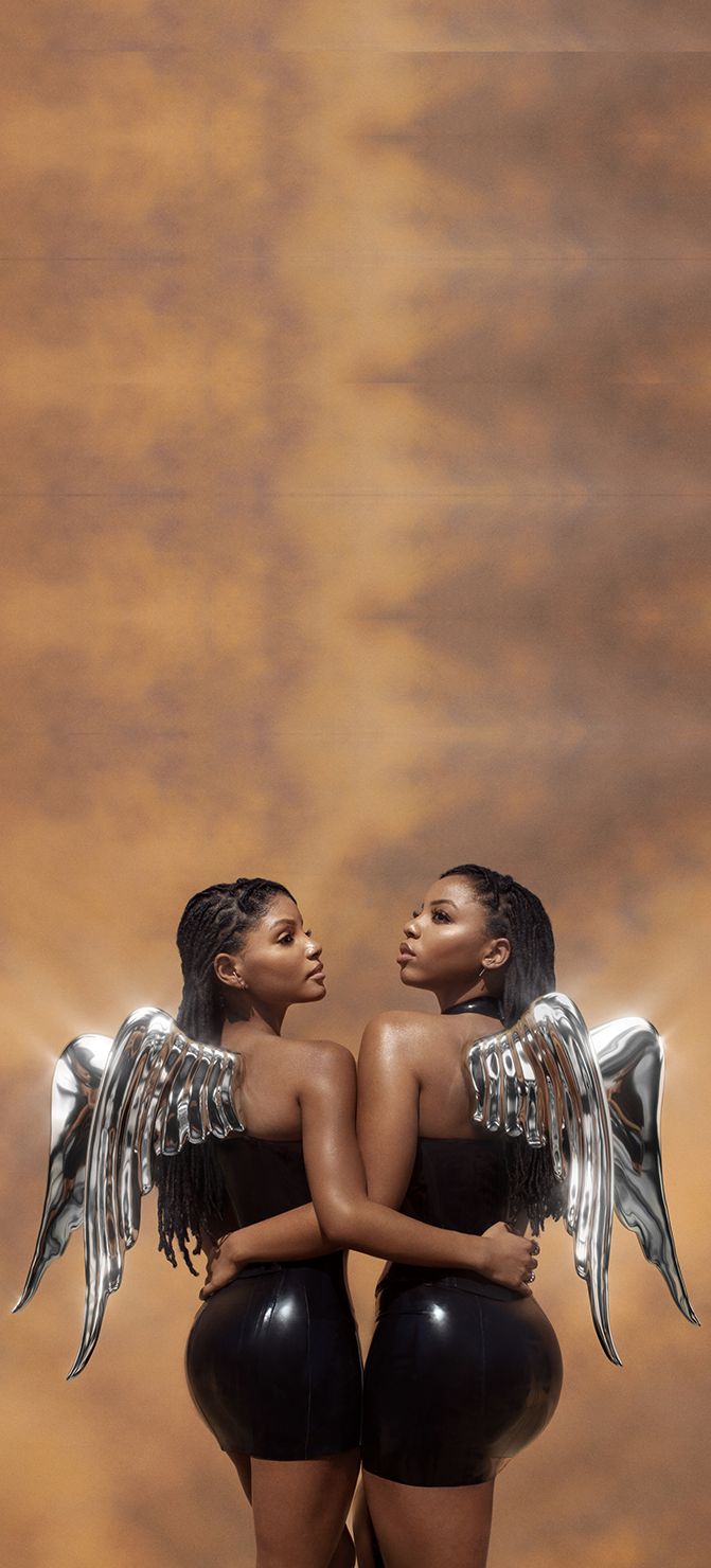 two black women with wings on their backs are standing in front of a brown background