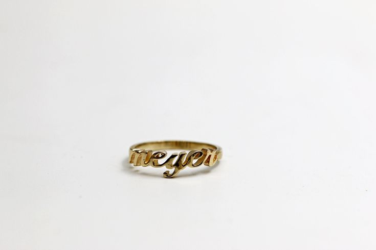 "Personalized name ring, made of solid 14k gold. A beautiful and dainty ring, customized especially for you. 14k yellow gold, cursive letters ring with a matte finish. A customized solid gold ring made just for you. Personalize the ring with any name or word you choose. It can be your name, a name of a loved one, a child's name, or any word that carries a special meaning or inspiration. This elegant and dainty 14k gold ring is a wonderful gift idea for a special woman in your life or for yoursel Minimalist 14k Gold Custom Name Ring, Minimalist Custom Name 14k Gold Ring, Customizable Minimalist 14k Gold Engraved Ring, Personalized 14k Gold Initial Ring For Promise, Customizable 14k Gold Promise Jewelry, Customizable 14k Gold Jewelry For Promise, 14k Gold Stackable Rings With Custom Name For Anniversary, Custom Name 14k Gold Stackable Rings For Anniversary, Classic 14k Gold Customizable Rings