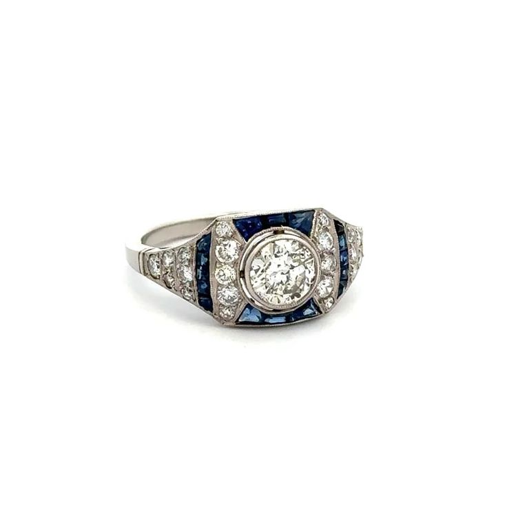 Indulge in luxury with this exquisite Platinum Diamond, Sapphire & Diamond Filigree Milgrain Ring from Regard Jewelry Austin, Texas. Made with .76ct Diamond, .48tcw Sapphire & .55tcw Diamond, this elegant ring is perfect for adding sophistication to any outfit. Weighing only 4.3g and in size 6.75, it is a lightweight and comfortable accessory. Luxury Cluster Sapphire Ring With Center Stone, Luxury Sapphire Diamond Ring With Diamond Cut, Luxury Platinum Sapphire Ring With Vvs Clarity, Luxury Sapphire Ring In Platinum With Vvs Clarity, Luxury Sapphire Cluster Ring With Brilliant Cut, Luxury Vvs Clarity Sapphire Ring In Platinum, Luxury Platinum Diamond Ring In Diamond White, Luxury White Gold Sapphire Ring With Vvs Clarity, Luxury Sapphire Ring With Round Stone