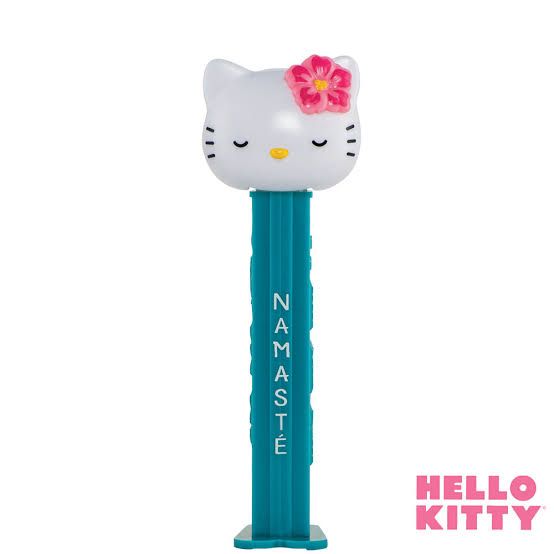 a hello kitty pen with a pink flower on it's head and the words namaste written in white