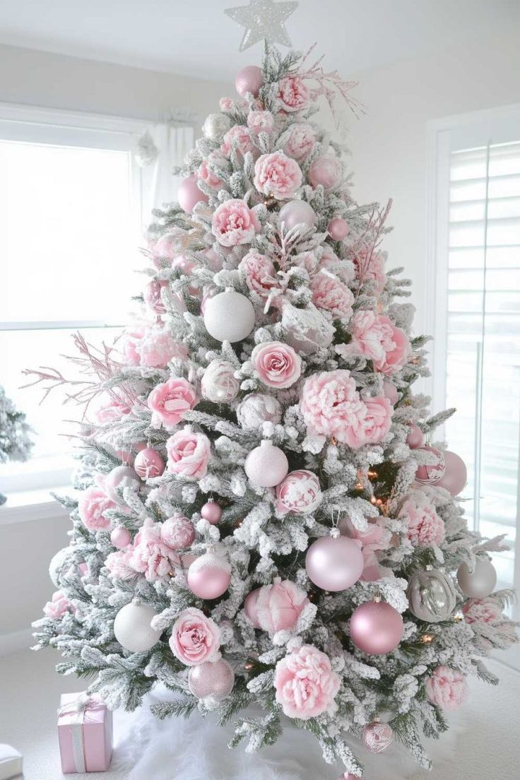 a christmas tree with pink and silver ornaments