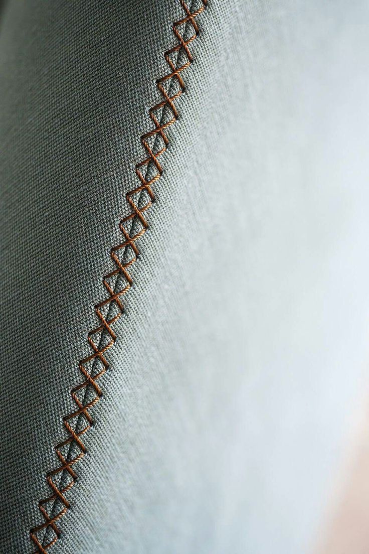 a close up view of a piece of fabric with stitching on the back and sides