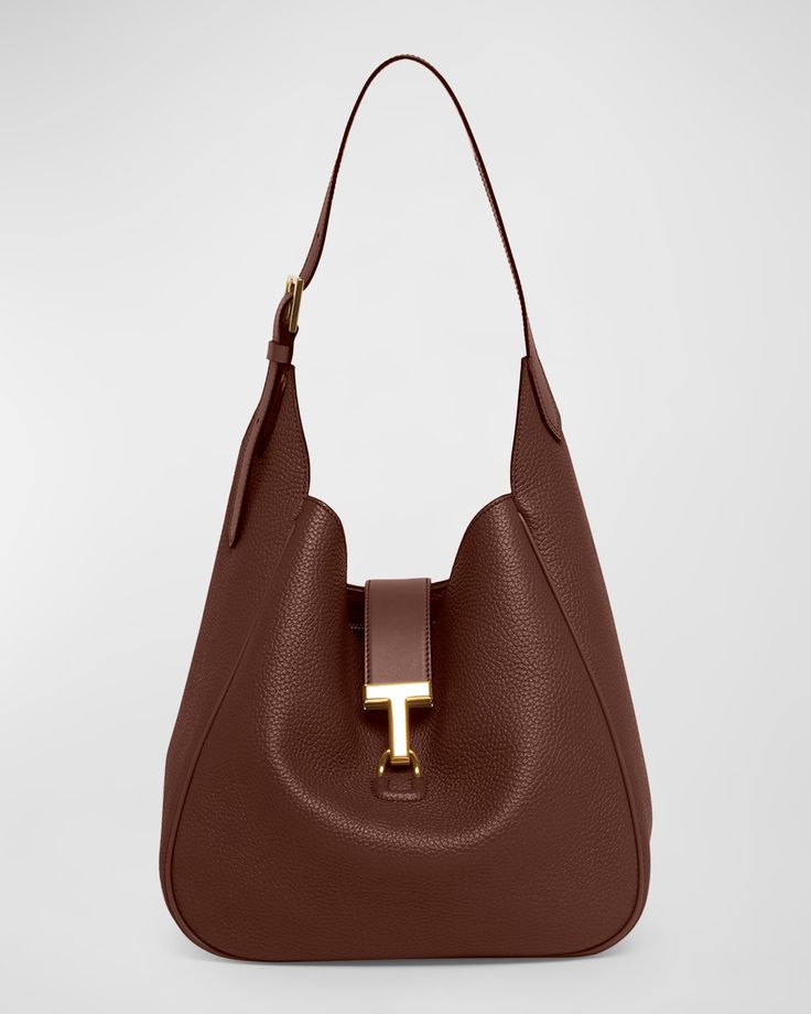 "Find TOM FORD Monarch Large Hobo Bag In Leather on Editorialist. TOM FORD \"Monarch\" hobo bag in grain leather Adjustable shoulder strap Open top with center T clasp closure Interior, one zip pocket and one slip pocket Approx. 13\"H x 13.8\"W x 5.1\"D Made in Italy" Designer Brown Hobo Bag With Top Carry Handle, Designer Brown Hobo Bag With Top Handle, Luxury Brown Versatile Hobo Bag, Luxury Brown Hobo Bag With Branded Hardware, Brown Top Handle Hobo Bag With Gold-tone Hardware, Large Hobo Bag, Tom Ford Bag, Saddle Brown, Hobo Bag