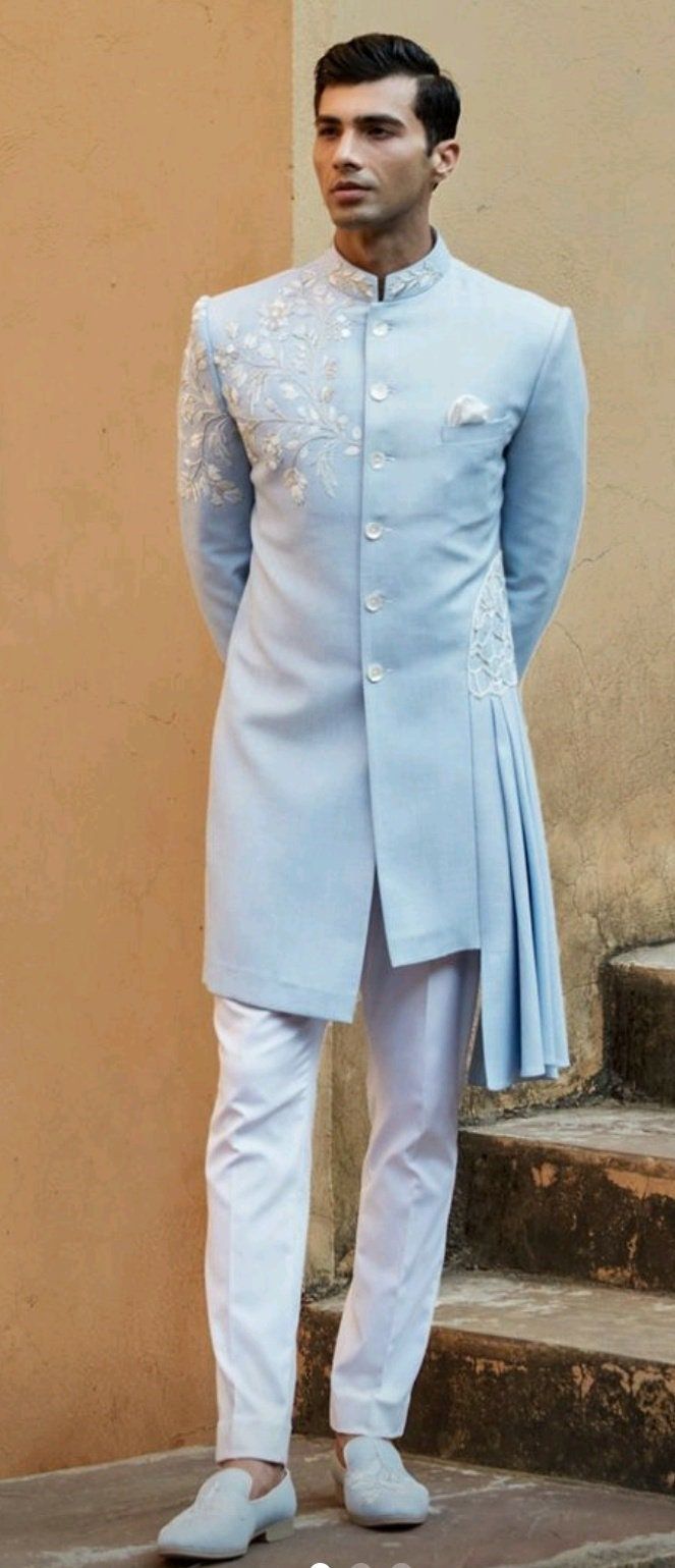 Details : Color - sky blue  Any Color you may ask for...(We can make it)  Fabric important Fabric  Work Details ;Embroidery Bottom Details -white- Pajama Package Include : Top , Bottom,, All others accessories are for photography purpose only . Just the Top and bottom available . Color variation may be there slightly , due to computer resolution and camera . Sky Blue Sherwani For Groom, Luxury Off-white Bandhgala For Eid, Luxury Silk Sherwani, Sherwani Latest Design, Luxury Art Silk Sherwani With Gota Work, Men Bridal Wear Indian, Sky Blue Sherwani For Men, Luxury Embellished Sherwani For Men, Blue Chikankari Embroidery Kurta For Reception