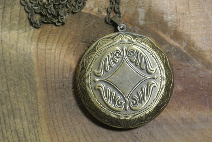 "Visit our full collection of vintage treasures at www.upcycledworks.com This Locket necklace is on a brass chain and measures 28\" in length. The locket measures 1 3/4\" round. It opens for your favorite photograph. Picture size for this locket is 1 1/4\" round. You will have to find a photo that fits and glue it into place. Sorry we do not engrave at this time. The perfect gift for all ages! H O W * T O * O R D E R: 1. Select options from the dropdown menu 2. Add to cart and proceed to checkou Picture Locket, Recycled Gifts, Mother Daughter Gifts, Vintage Lockets, Pocket Watch Chain, Upcycled Jewelry, How To Make Shorts, Jewelry Cleaner, Picture Size