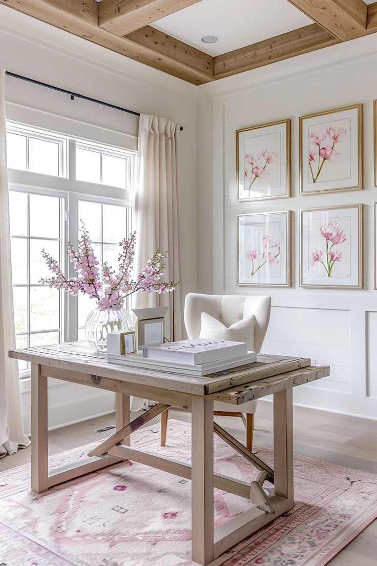 a living room filled with furniture and pictures on the wall above a wooden coffee table