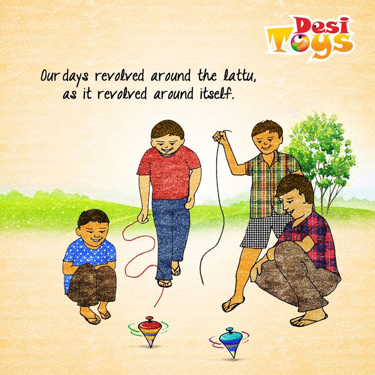 three children are playing with kites in the sand and one boy is holding an apple