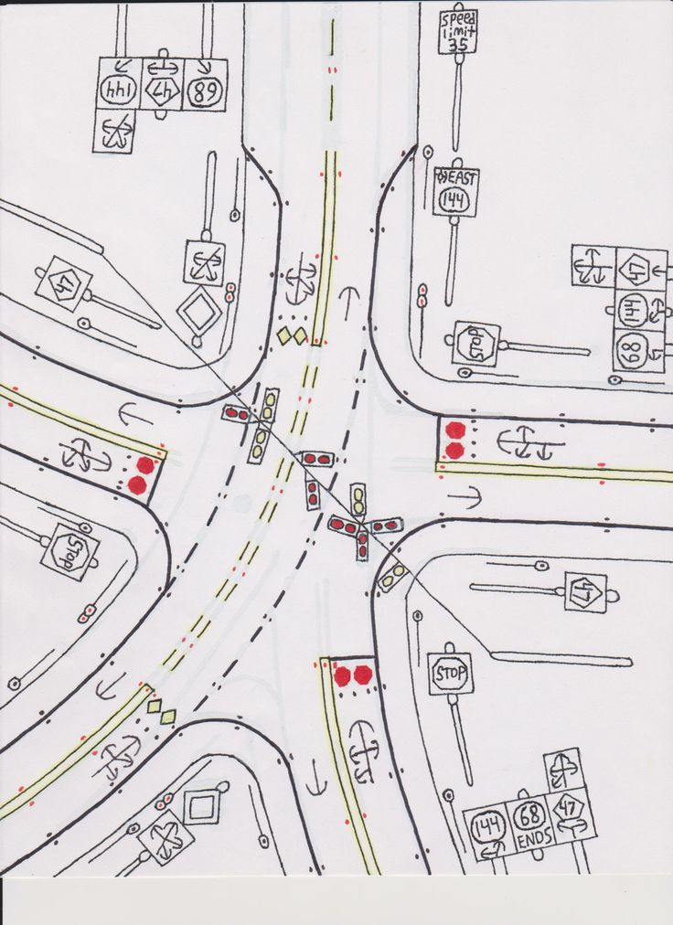 an overhead view of a street intersection with cars and trucks on the road in red