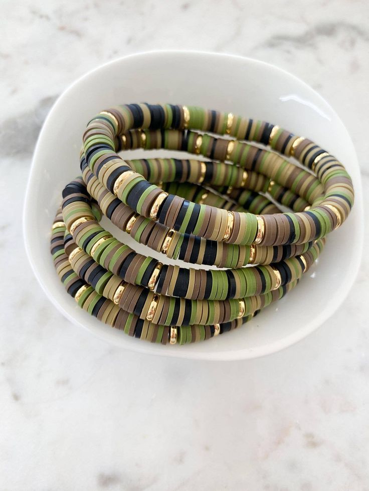 olive green brown black gold disc bracelet 7.5" Heishi Jewelry, Vinyl Disc, Homemade Bracelets, Diy Bracelets Tutorials, Polymer Clay Bracelet, Clay Bracelet, Diy Bracelets Patterns, Diy Bracelet Designs, Beads Bracelet Design