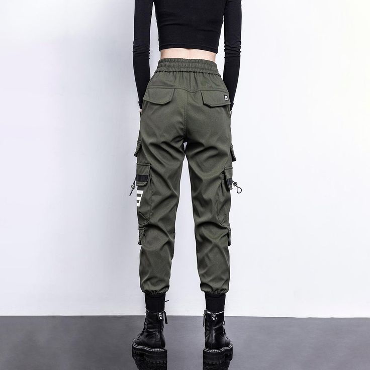 Our new Military Techwear Pants are the perfect addition to your wardrobe. Combining function with fashion, these pants are made with a comfortable fit and a stylish design. The perfect choice for the modern woman, these pants are ideal for both everyday wear and workouts.Featuring a lightweight, breathable fabric, our Military Techwear Pants are perfect for any activity. The high-waisted design provides full coverage and support, while the form-fitting silhouette flatters your figure. The taper Techwear Ankle-length Bottoms For Streetwear, Ankle-length Techwear Bottoms For Streetwear, Techwear Ankle-length Pants For Streetwear, Techwear Ankle-length Streetwear Pants, Athleisure Ankle-length Cargo Pants With Side Pockets, Techwear Ankle-length Cargo Pants For Streetwear, Ankle-length Pants With Side Pockets For Streetwear, Sporty Ankle-length Cargo Pants With Side Pockets, Functional Ankle Pants With Pockets