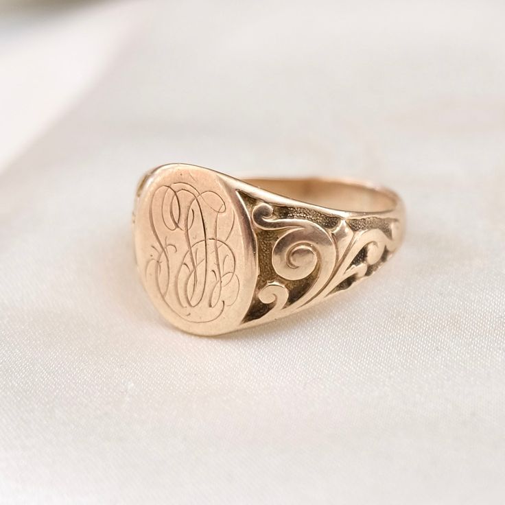 Discover a little signature love with this 10k antique solid gold original vintage signet ring from the late 1800s. In the original signet ring design this beauty is timeless - traditionally representing the confirmation of personal identity, dating back to the Romans, this ring features intricate family initials which we believe to be SAB or LAS. This sweet antique ring with remind you to always love yourself for who you are * Size 9 * 10k solid gold * can be resized * Item is available for lay Antique Oval Hallmarked Signet Ring, Vintage Oval Signet Ring With Hallmarks, Victorian Oval Rings With Engraving Option, Antique Oval Signet Ring Stamped 14k, Antique Oval Initial Ring For Formal Occasions, Victorian Oval Ring With Engraving Option, Antique Oval 14k Stamped Signet Ring, Heirloom Oval Signet Ring With Engraving Option, Vintage Oval Signet Ring In 14k Gold