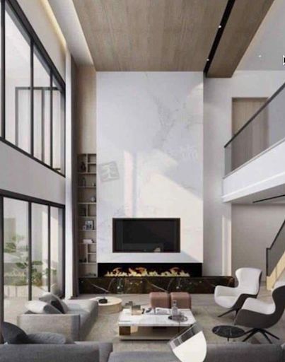 modern living room with fireplace and large windows