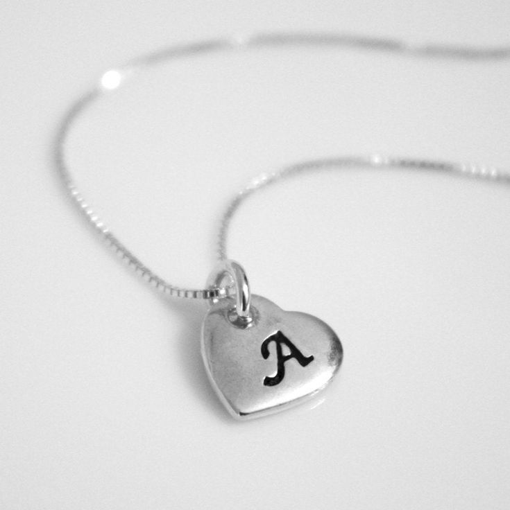 "Personalized sterling silver heart pendant on fine sterling silver chain necklace Please see second photo for size reference.   Necklace length:  Available in different sizes.  Please see sizing guide and select preference form drop down list Comes beautifully gift packaged, ready for gift giving.  If you want the item gift packaged with a message, please type your message in the \"add your personalization\" box at the listing page Shipping Policy:  Please see FAQs below" Silver Necklace With Initial Pendant And Heart Charm, Silver Heart Necklace With Initial Pendant, Sterling Silver Initials Charm Necklace For Birthday, Silver Necklace With Heart Charm For Birthday, Sterling Silver Initials Charm Necklace For Birthdays, Simple Silver Heart Necklace For Valentine's Day, Silver Heart Initial Pendant Necklace, Birthday Sterling Silver Initial Pendant Charm Necklace, Sterling Silver Initial Pendant Charm Necklace For Birthday