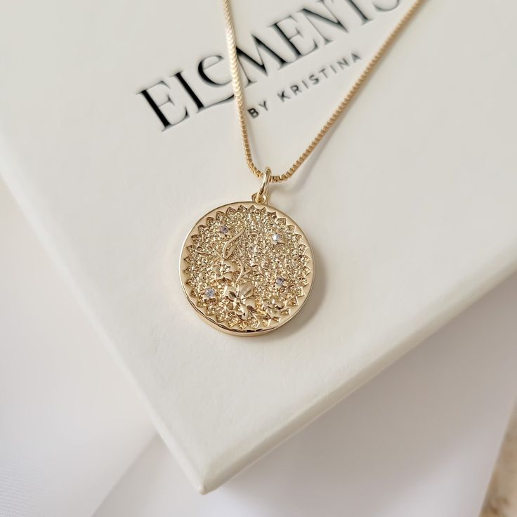 Cherry blossom round pendant necklace. Wear it on it's own or layer it. Pendant details: * Material: non tarnish gold filled* Measurements: 0.8' H 0.7' WChain: non tarnish gold filledComes in our gift ready packaging: vegan leather pouch for safe jewelry storing and branded box Gold-tone Gold Plated Round Charm Necklace, Gold-tone Round Pendant Charm Necklace, Gold-tone Gold Plated Charm Necklace With Round Pendant, Gold-tone Chain Necklace As A Gift, Gold-tone Round Chain Necklace For Gift, Dainty Gold-tone Round Necklace, Gold Plated Chain Necklace As Gift, Gold-tone Round Pendant Charm Necklace, Tarnish Resistant, Gold Plated Round Chain Necklace For Gifting