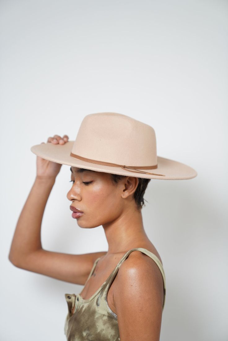 Be ready for whatever adventures life throws at you with the Lulus Take the Scenic Route Fedora Hat! Soft felt shapes this essential fedora with a semi-structured wide-brim and a traditional tear-drop crown. Matching leather string band adds just the perfect amount of something' extra! Internal drawstrings allow for the perfect fit. 100% Australian wool Spot Clean Please Read Before Purchasing: Our hats are made to fit average head sizes, the average adult head circumference to be 55cm (21 3⁄4 ) Fedora Hats For Women, Black Fedora Hat, Felt Shapes, Suede Hat, Wool Fedora Hat, Black Fedora, Hat Styles, Rancher Hat, Fedora Hat Women