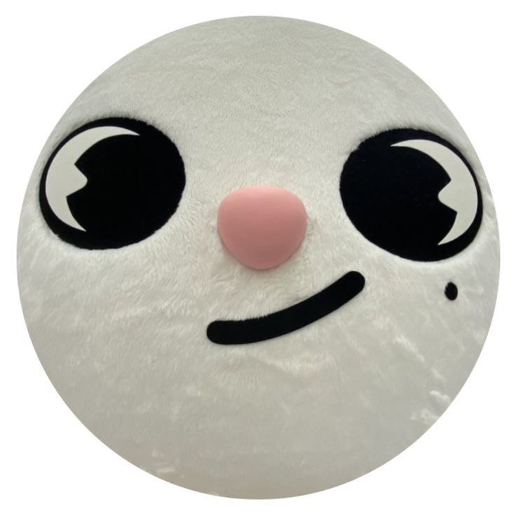 a close up of a white ball with black eyes and a pink nose on it