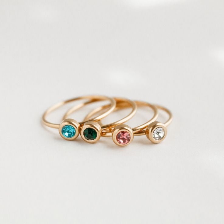 This listing is for a beautiful birthstone ring, crafted from high-quality metal and gemstone that represents the wearer's birth month. Each birthstone is associated with specific qualities, making this ring a meaningful and personal accessory. The ring features a simple yet elegant design that showcases the gemstone. Whether worn as a daily reminder of one's special qualities, or given as a sentimental gift, this birthstone ring is a timeless and cherished accessory. Choose your birth month and Nickel-free Jewelry For May Birthstone Birthday, Adjustable Rose Gold Birthstone Ring For Gift, Adjustable Rose Gold Birthstone Ring As Gift, Dainty Crystal Ring With Birthstone For Promise, Dainty Crystal Birthstone Ring For Promise, Dainty Birthstone Crystal Ring, Rose Gold Jewelry With Birthstone In Round Band, Rose Gold Round Band Jewelry With Birthstone, Rose Gold Jewelry With Birthstone