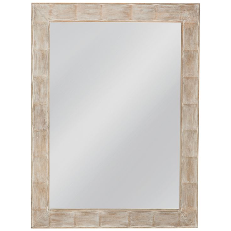 a wooden frame mirror on a white wall with a light brown border around the edges