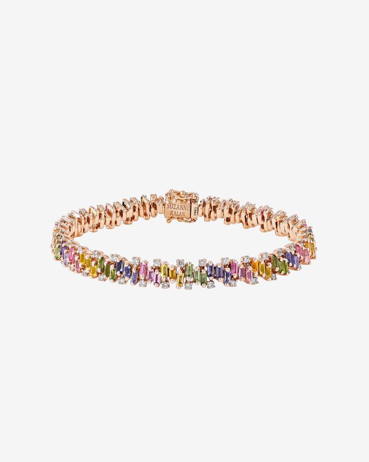 Immerse yourself in the vibrant hues and refined grace of the Shimmer Tennis Bracelet. This exquisite accessory is thoughtfully crafted, featuring 7.5 carats of lustrous pastel sapphire baguettes, beautifully paired with 1.31 carats of brilliant round diamonds. This bracelet is a celebration of color and sophistication, designed to add a touch of elegance to any ensemble. Details 18k yellow gold or rose gold 7.50 carats of pastel sapphire baguettes 1.31 carats of round white diamonds Bracelet me Rainbow Sapphires, Fashion Organization, Vs Diamond, Jewelry Tray, Tennis Bracelet, World Of Color, Bracelet Sizes, Diamond White, Diamond Bracelet