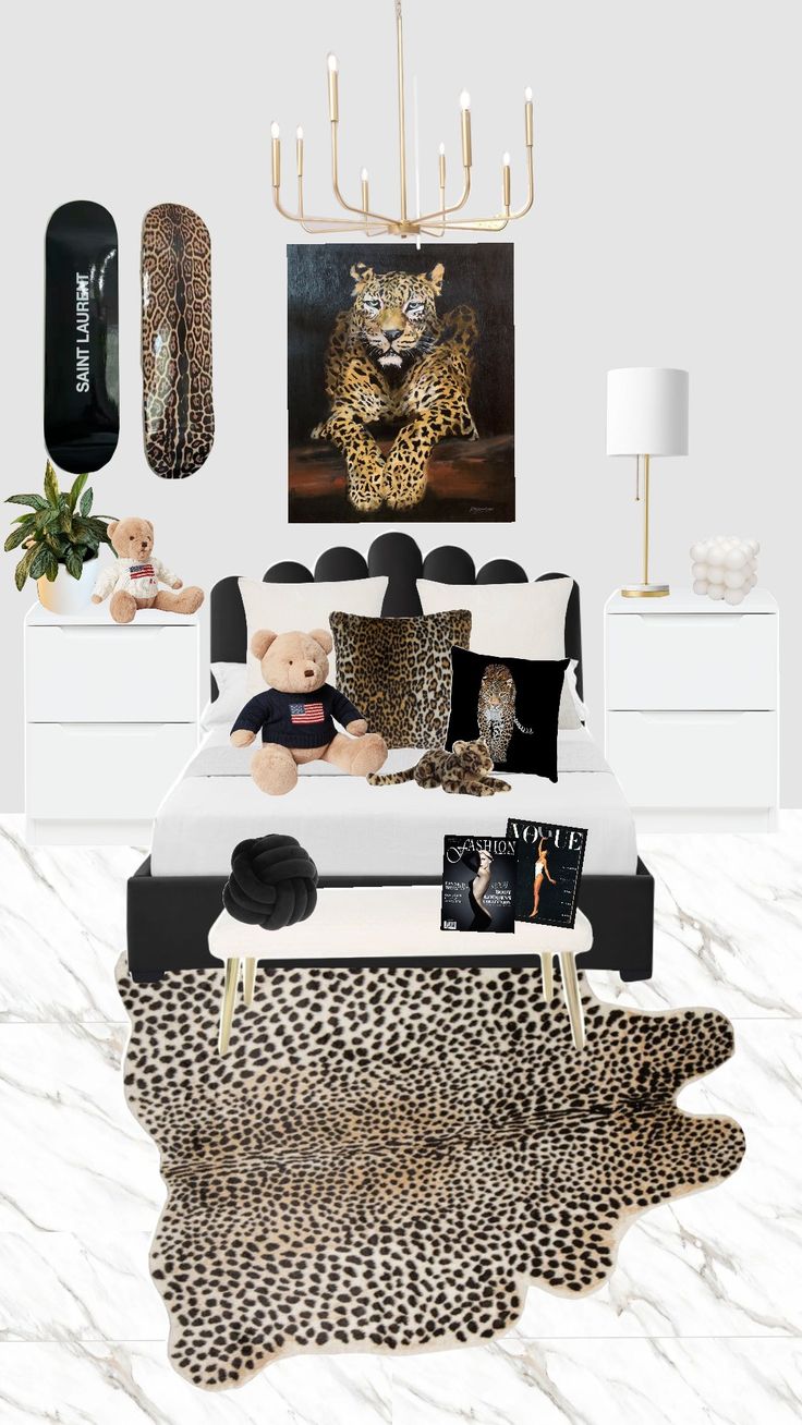 a bedroom decorated in black, white and leopard print