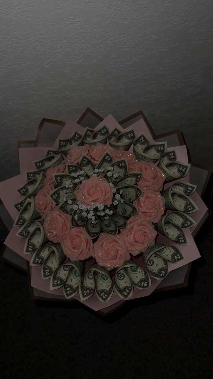 a bouquet of roses is made out of money