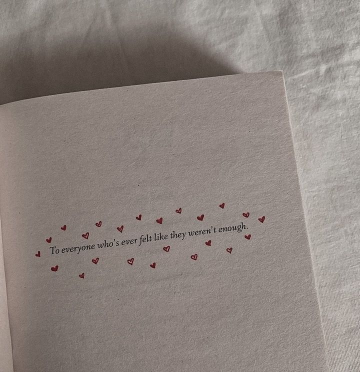 an open book with red hearts on it and the words to everyone who ever tells that they want enough