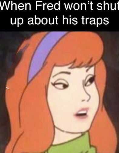 a cartoon girl with long red hair and green shirt, text reads when fed won't shut up about his traps