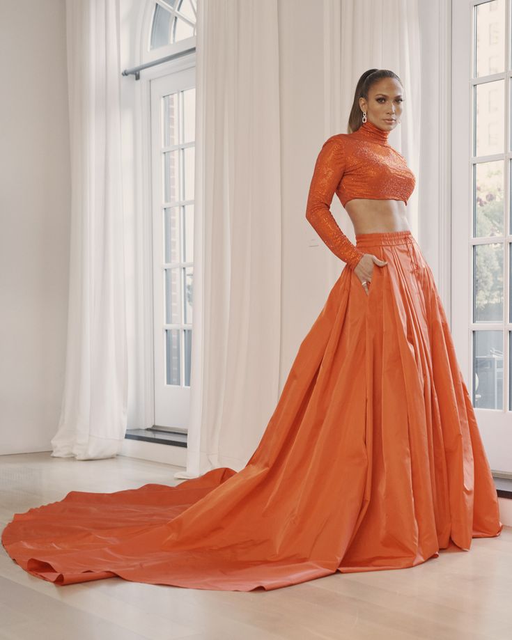 Ralph Lauren's custom look for Jennifer Lopez at the 2019 #CFDAAwards.  Her cropped jersey top is hand-embellished with 43,200 crystals, and her pleated silk skirt is engineered with concealed pockets and a drawcord waistband.  #RLRedCarpet Couture, Fitness Workouts, Jenifer Lopes, J Lo Fashion, Cropped Jersey, Birthday Dress 21st, Cfda Awards, Fashion Awards, Fashion Icon