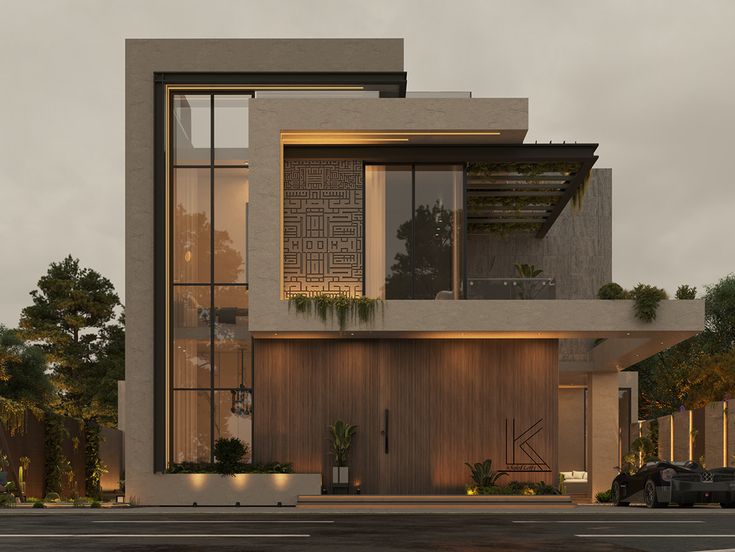 a large modern house with lots of windows and plants on the front porch, along with cars parked outside