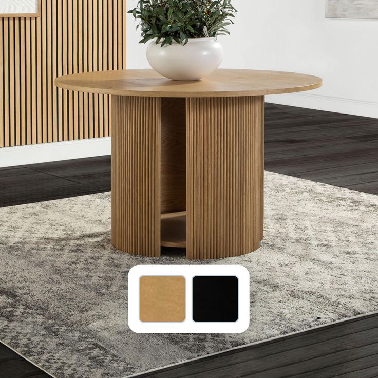 a round wooden table with a plant in the center on a carpeted room floor