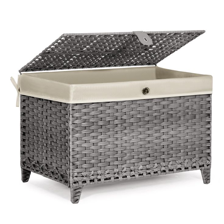 an outdoor wicker chest with lid and seat cushion in grey, on white background