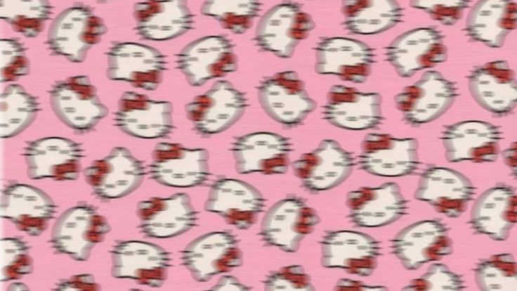 a pink background with hello kitty hearts and bows on the front, in red and white