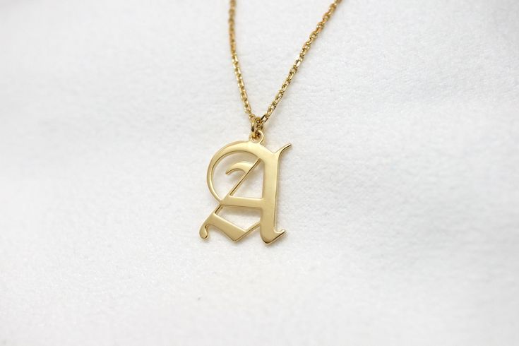 + Personalized Old English Initial Necklace + This initial necklace is a perfect gift for any occasion. * Letters : approx. 15 mm depending on the letter * Chain : Select the option from 1st drop down menu * silver / 18k gold plated / 18k rose gold plated * individually gift wrapped If you would like to see more name necklaces on my shop please go to below link! https://www.etsy.com/shop/TwilleyStreet?ref=seller-platform-mcnav&search_query=name+necklace If you would like to see choker neckla Dainty Monogram Name Necklace For Personalized Gift, Elegant Mother's Day Initial Necklace With Name, Elegant Mother's Day Initial Necklace, Elegant Custom Name Charm Necklaces For Anniversary, Elegant Custom Name Charm Necklace For Anniversary, Anniversary Initial Pendant Necklace With Custom Name, 14k Gold Personalized Initial Necklace, Personalized 14k Gold Initial Necklace As Gift, Classic Personalized Initial Necklace For Mother's Day