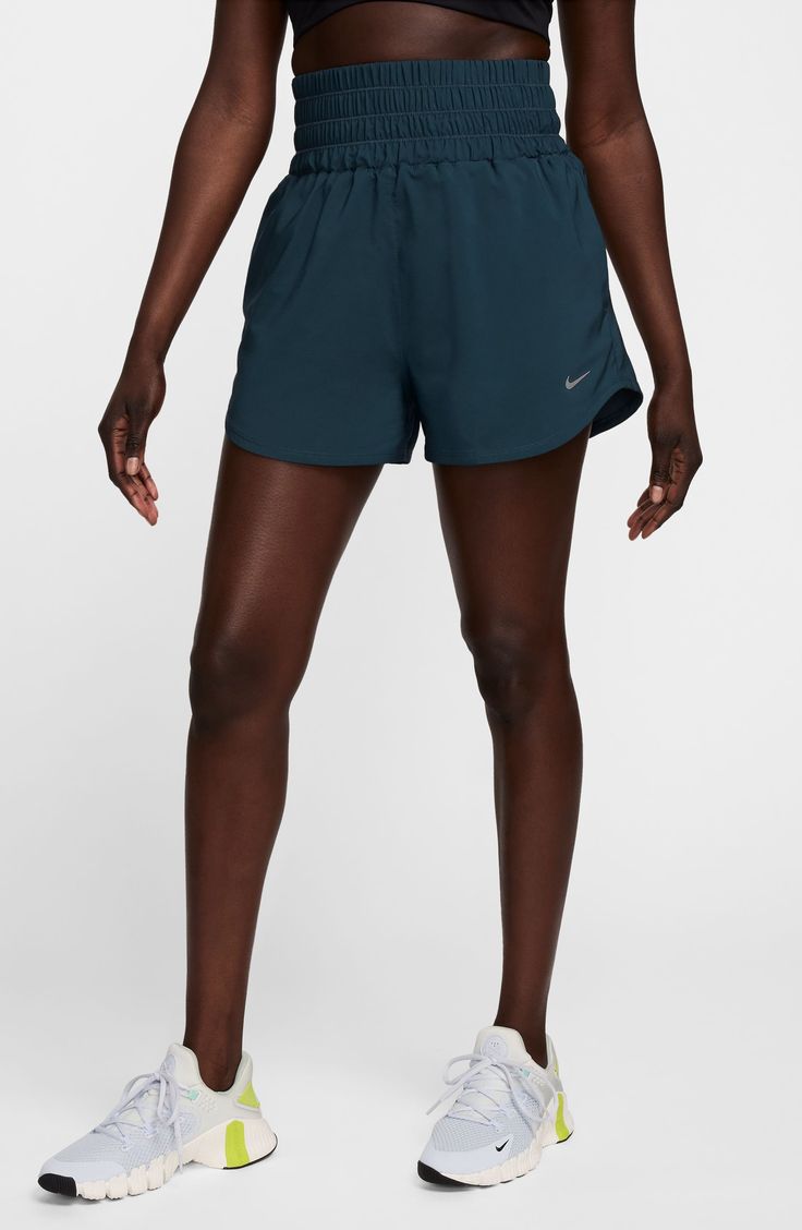 Gear up for your run with these lightweight high-waisted shorts constructed from moisture-wicking fabric and designed with brief lining for extra support. 3" inseam; 26" leg opening; 13 1/2" front rise; 17" back rise (size Medium) Elastic waist Side-seam pockets Dri-FIT moisture-wicking technology Brief liner 100% polyester Machine wash, tumble dry Imported Functional Running Shorts With Short Inseam, Nike Running Bottoms Athleisure Style, Nike Athleisure Bottoms For Running, Nike Athleisure Running Bottoms, Functional Running Athletic Shorts With Short Inseam, Nike Athleisure Shorts With Short Legs, Stretch Shorts For Marathon, Nike Functional Athletic Shorts, Nike Athletic Stretch Shorts