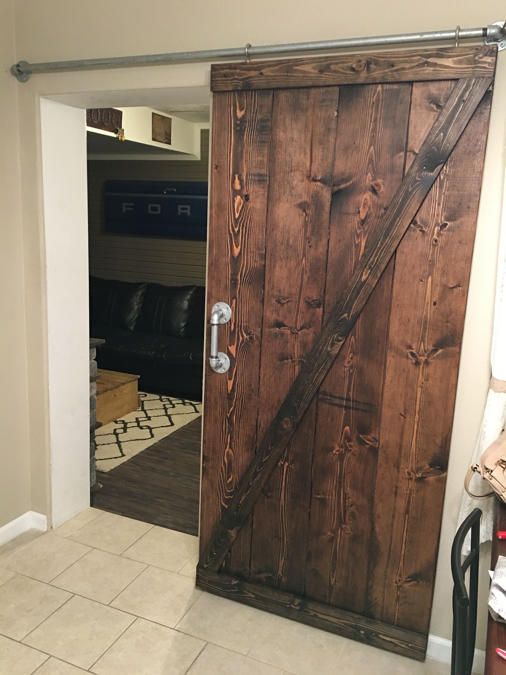 Elegant DIY picnic table made from reclaimed barn door