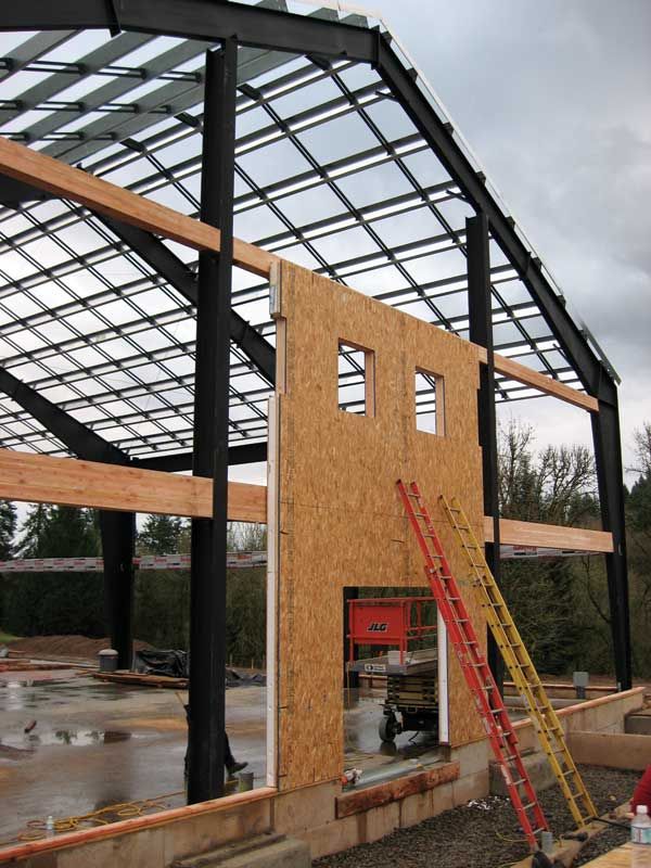 Integrating structural insulated panels with metal-framed buildings ...