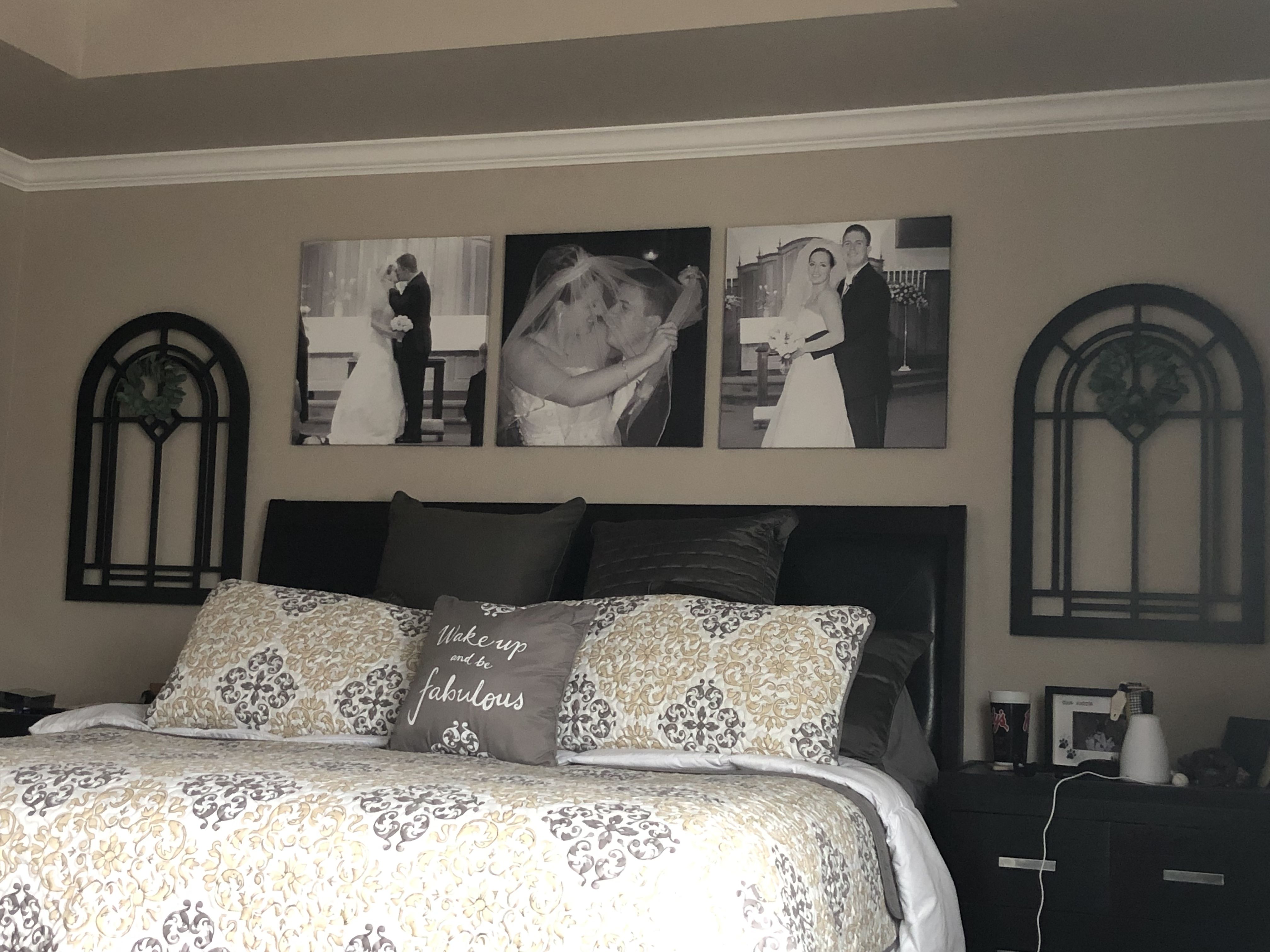 Master bedroom. Wedding photos above bed | Master bedroom wall decor