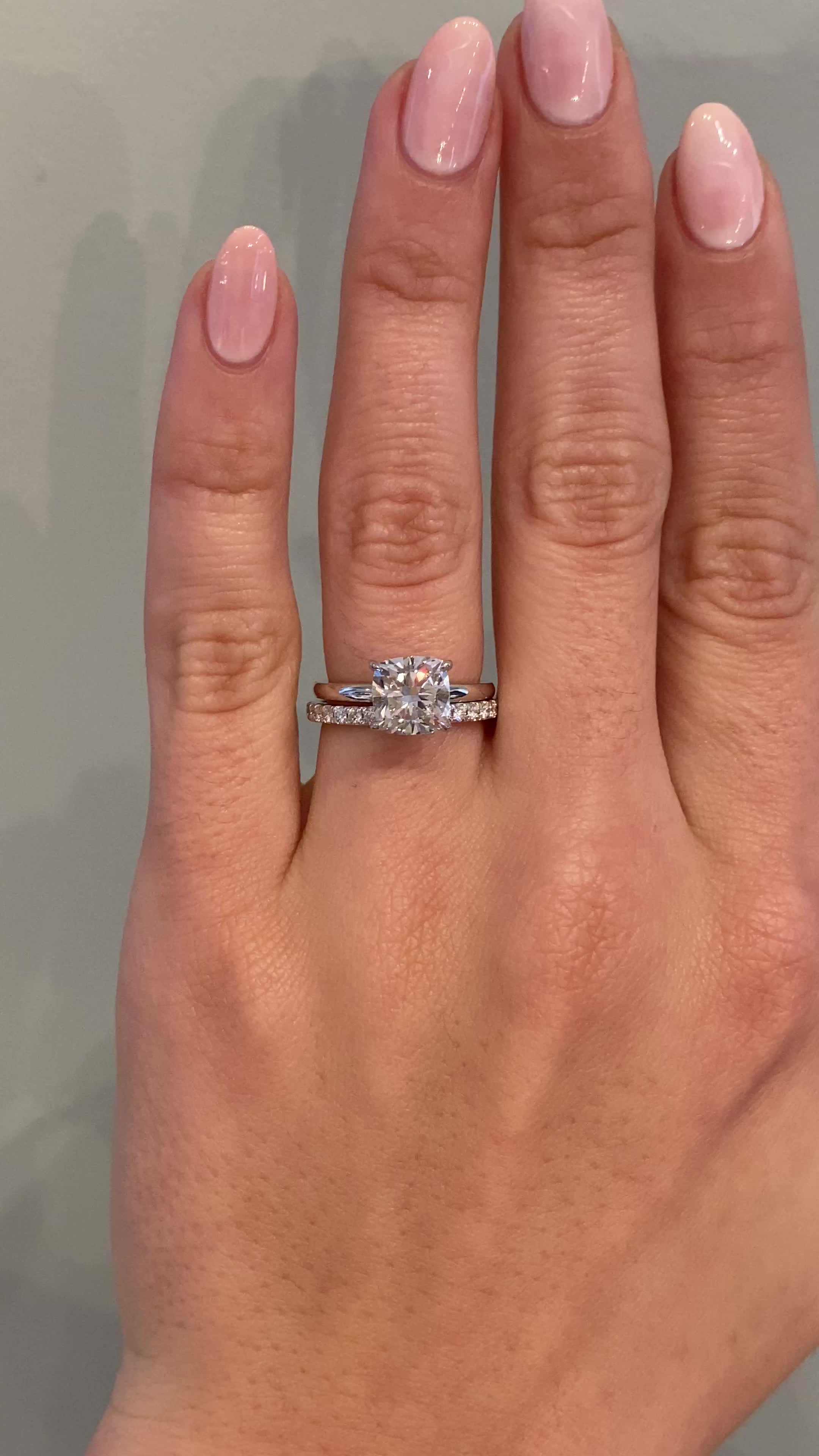 Our clients requested simplicity and beauty. Here they are in our Ariya: elegant, timeless and perfect, set with a cushion cut diamond. Approx Band Width (mm): 1.70mm Approx Production Time: 4-5 weeks Drop-down diamond options represent our recommended grade, which maximizes size for value, while maintaining eye-perfect clarity and giving you a colorless look. For other diamond options, see our Shop Diamonds tab or speak to one of our design consultants. This design can also be made with other s